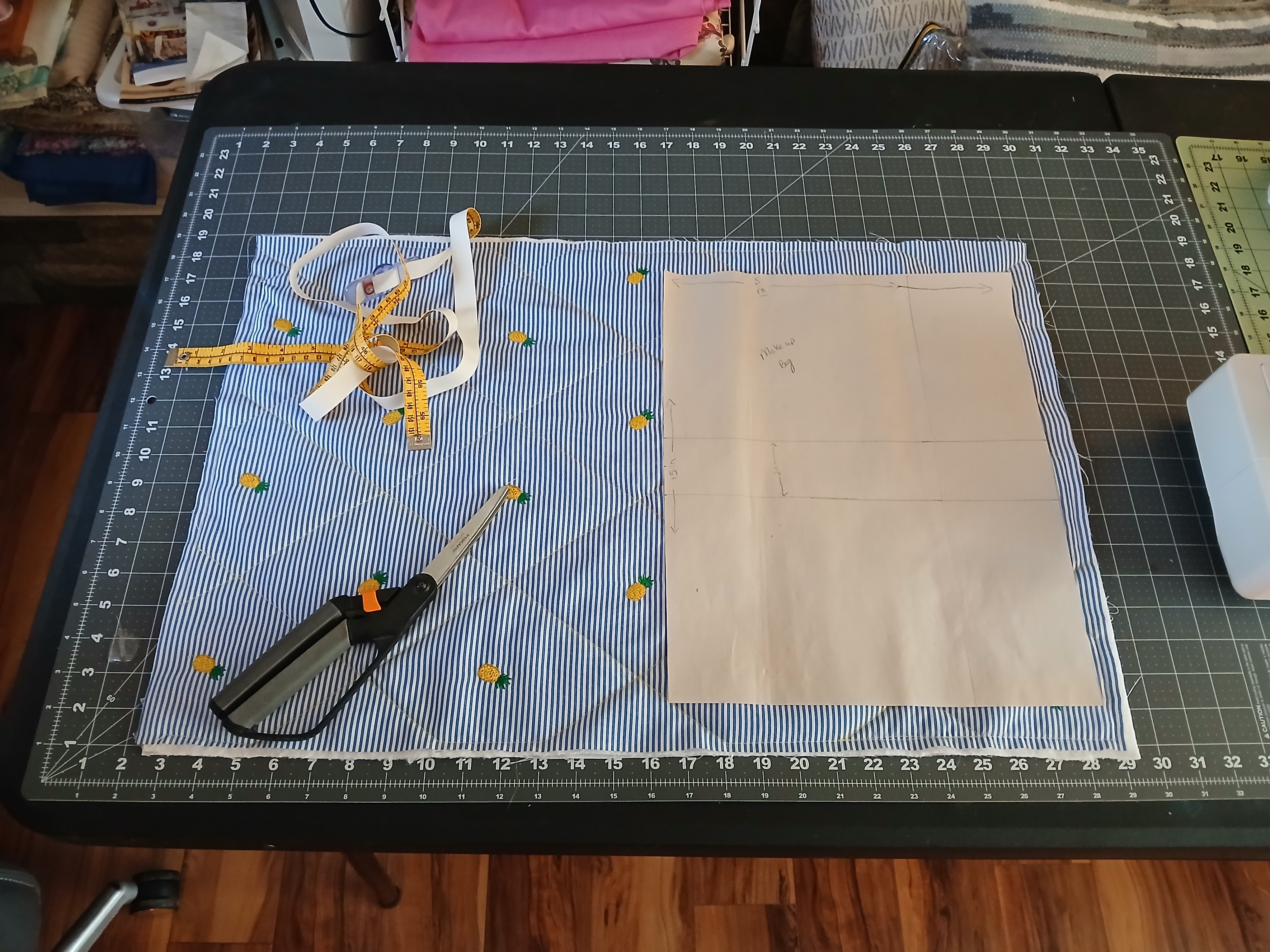 Fabric laid on cutting mat with pattern pieces